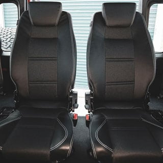 Seat  - Left Rear - Lock &amp; Fold - 1/2 Leather - Xs Black Rack - Defender